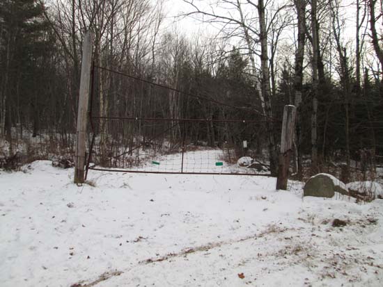 The Glencliff Trail trailhead at the edge of the parking area