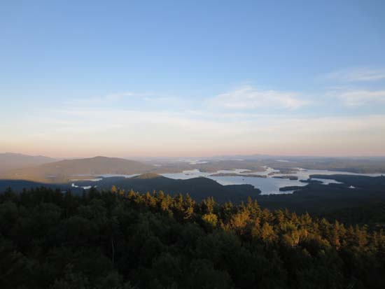 Looking at Red Hill, the Rattlesnakes, and Squam Lake from the Mt. Morgan ledges - Click to enlarge