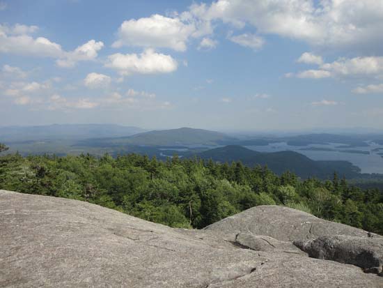 Looking at the Ossipees, Red Hill, and Rattlesnakes from the Mt. Morgan ledges - Click to enlarge