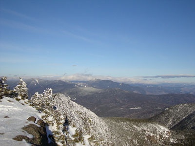 Looking at the Hancocks and Mt. Carrigain from the Mt. Osceola ledges - Click to enlarge