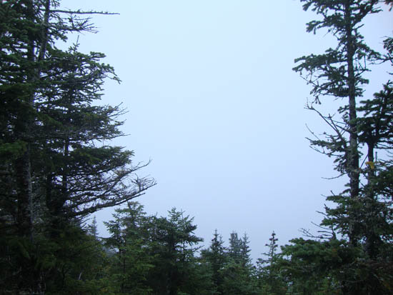 Looking at the Tripyramids from the Mt. Tecumseh summit vista - Click to enlarge