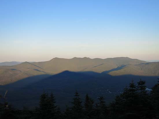 Mt. Tecumseh casting its shadow over Waterville Valley - Click to enlarge