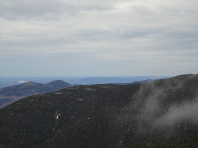 The Baldfaces and Pleasant Mountain as seen from the ledge near the summit of South Carter - Click to enlarge