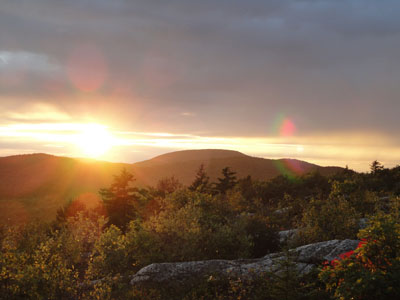The sunset over Belknap Mountain from Straightback Mountain - Click to enlarge