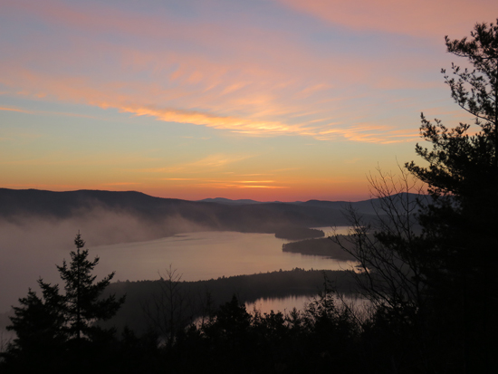 The sunrise over Newfound Lake as seen from near the summit of Sugarloaf - Click to enlarge
