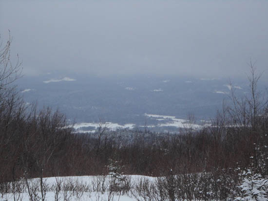 Slight views into the valley from the northeast peak of Tenney Mountain - Click to enlarge