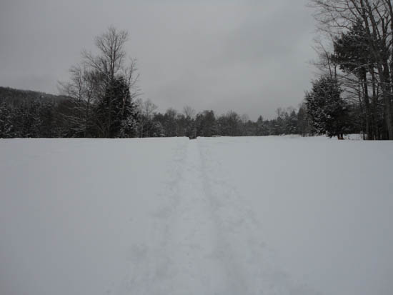 The bottom of the ski trail to the right of the main lodge