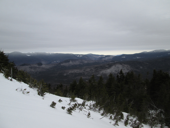 Looking at the Bonds and Willey Range from the scree field in the col adjacent to Vose Spur - Click to enlarge