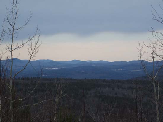 Looking northwest, possible at Mt. Mansfield in the far distance, from a ledge near the summit of Whites Pinnacle - Click to enlarge