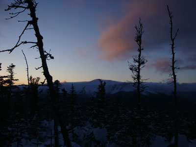 Sunset colored clouds over Mt. Washington as seen from near the Wildcat B summit - Click to enlarge
