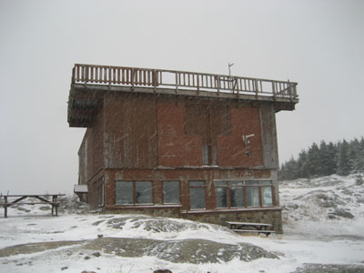 The old Wildcat Gondola summit terminal in a snow storm - Click to enlarge