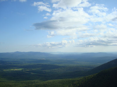 Looking south at the Ossipees, Belknaps, and Red Hill from the vista near the Wonalancet Hedgehog summit. - Click to enlarge