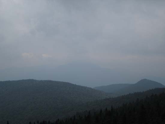 Looking southwest at Camel's Hump from near the summit of Ricker Mountain - Click to enlarge