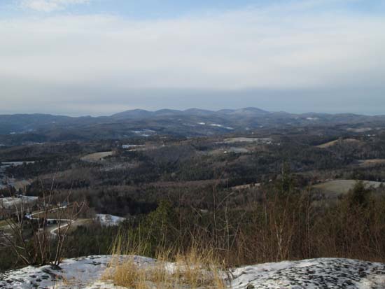 Looking northwest toward the mountains in Groton State Forest from the Wrights Mountain ledges - Click to enlarge